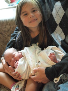 Katie holding Anabel for the first time.