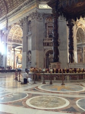 Praying at St. Peter's altar